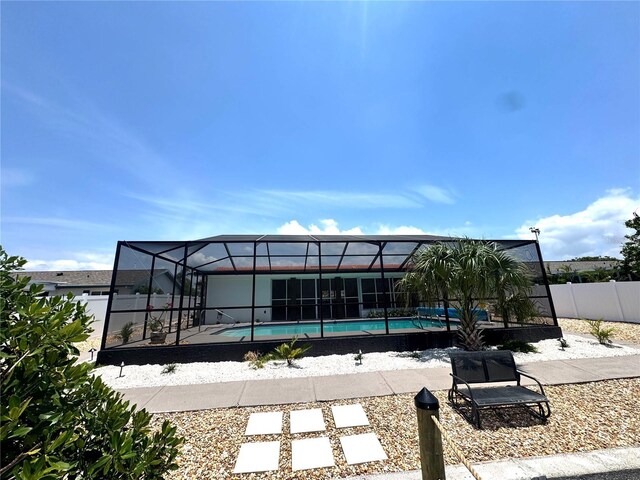 6524 Senegal Palm Way, Apollo Beach, FL 33572 - view of pool featuring a fenced backyard, glass enclosure, and a patio area