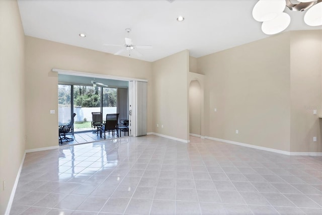 6222 Country Club Way, Sarasota, FL 34243 - spare room with ceiling fan, arched walkways, light tile patterned floors, baseboards, and recessed lighting