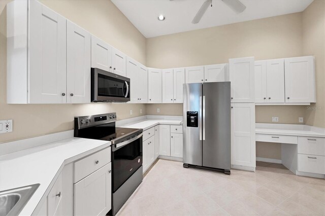 6222 Country Club Way, Sarasota, FL 34243 - kitchen featuring stainless steel appliances, a ceiling fan, light countertops, white cabinets, and recessed lighting