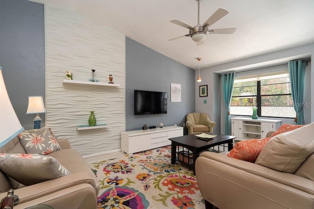 living room with lofted ceiling and ceiling fan