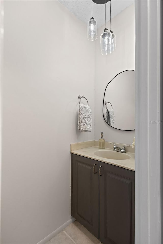 3212 Ramblewood Dr N Unit 3212, Sarasota, FL 34237 - bathroom with vanity and tile patterned floors