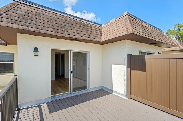 3212 Ramblewood Dr N Unit 3212, Sarasota, FL 34237 - view of wooden deck