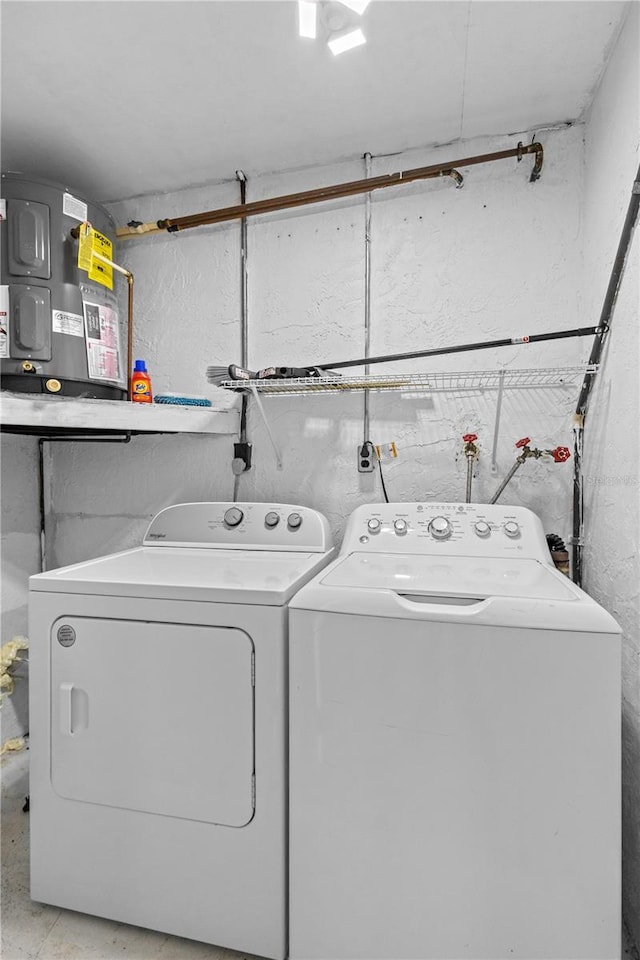 3212 Ramblewood Dr N Unit 3212, Sarasota, FL 34237 - laundry room with washing machine and clothes dryer