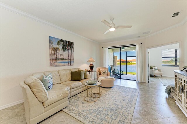 24065 Canterwood Way, Venice, FL 34293 - living room featuring ornamental molding, ceiling fan, baseboards, and light tile patterned flooring