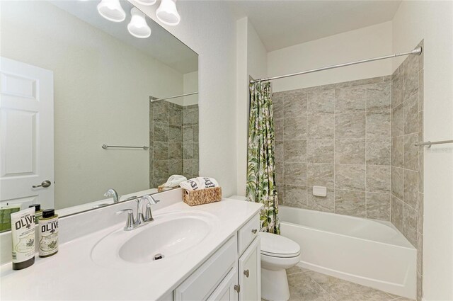 24065 Canterwood Way, Venice, FL 34293 - bathroom with toilet, vanity, shower / bath combo with shower curtain, and tile patterned flooring