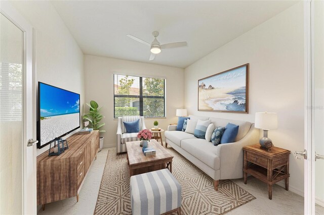 24065 Canterwood Way, Venice, FL 34293 - living room with a ceiling fan, baseboards, and light tile patterned flooring
