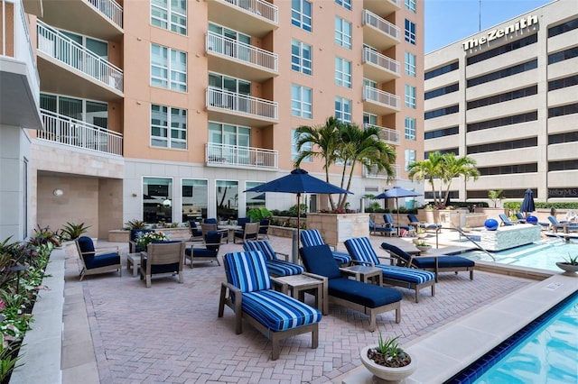1350 Main St Unit 1703, Sarasota, FL 34236 - community pool with a patio and an outdoor living space