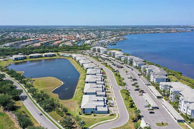 1017 Tidewater Shores Loop Unit 1017, Bradenton, FL 34208 - aerial view of residential area featuring a nearby body of water