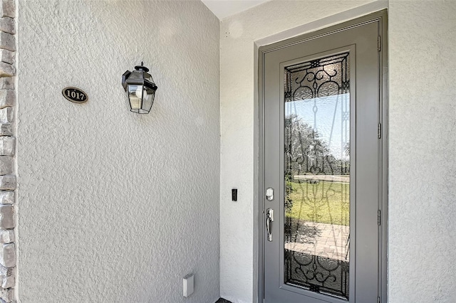 1017 Tidewater Shores Loop Unit 1017, Bradenton, FL 34208 - entrance to property with stucco siding