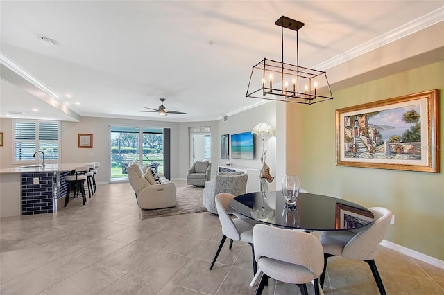 1017 Tidewater Shores Loop Unit 1017, Bradenton, FL 34208 - dining room with crown molding, a ceiling fan, light tile patterned floors, baseboards, and recessed lighting