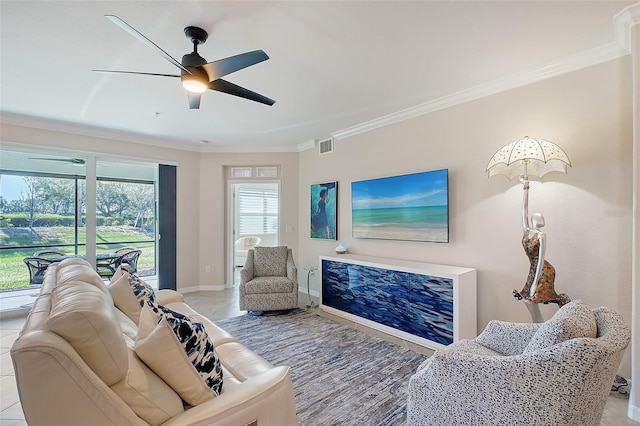 1017 Tidewater Shores Loop Unit 1017, Bradenton, FL 34208 - living room with ornamental molding, a ceiling fan, and baseboards