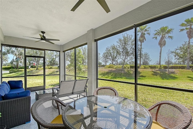 1017 Tidewater Shores Loop Unit 1017, Bradenton, FL 34208 - sunroom with a ceiling fan, outdoor dining area, and outdoor lounge area