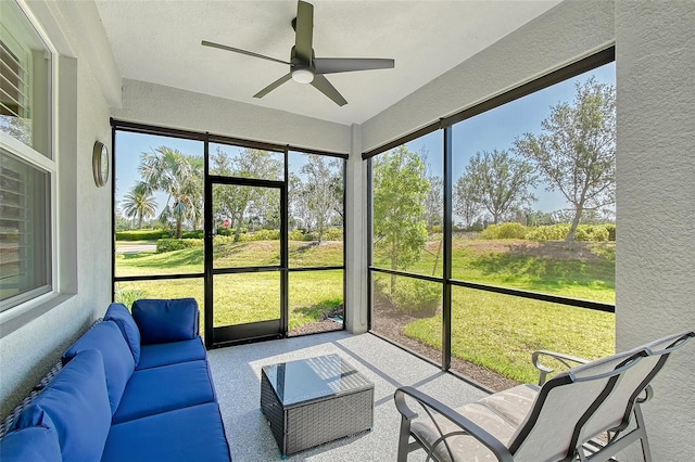 1017 Tidewater Shores Loop Unit 1017, Bradenton, FL 34208 - sunroom / solarium with a ceiling fan, an outdoor living space, and plenty of natural light