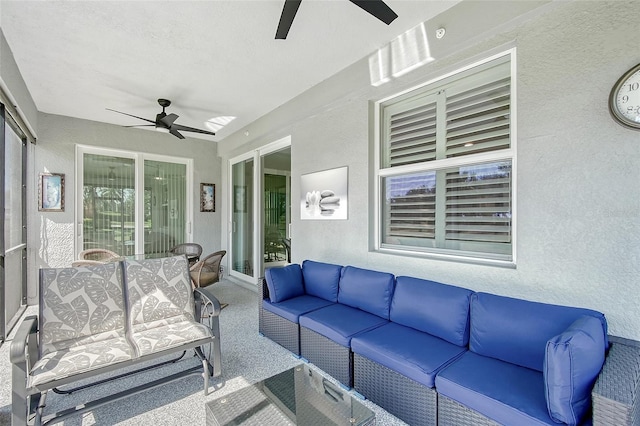 1017 Tidewater Shores Loop Unit 1017, Bradenton, FL 34208 - sunroom / solarium featuring a ceiling fan, outdoor lounge area, and a textured wall