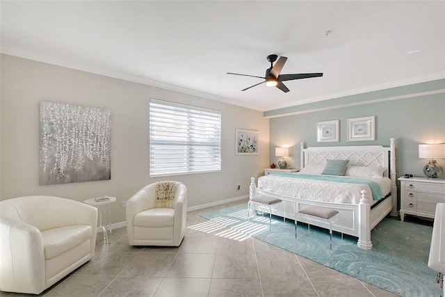 1017 Tidewater Shores Loop Unit 1017, Bradenton, FL 34208 - bedroom featuring crown molding, baseboards, a ceiling fan, and tile patterned flooring