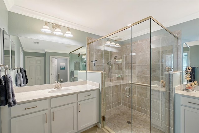 1017 Tidewater Shores Loop Unit 1017, Bradenton, FL 34208 - full bathroom with ornamental molding, a shower stall, vanity, and tile patterned flooring