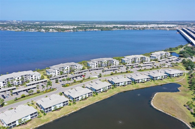 1017 Tidewater Shores Loop Unit 1017, Bradenton, FL 34208 - drone / aerial view of a nearby body of water and apartment complex