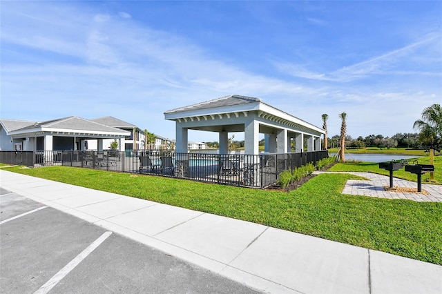 1017 Tidewater Shores Loop Unit 1017, Bradenton, FL 34208 - view of home's community with a water view, a gazebo, and uncovered parking