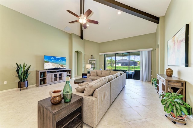 518 Chantilly Trl, Bradenton, FL 34212 - living room with arched walkways, light tile patterned flooring, a ceiling fan, high vaulted ceiling, and beamed ceiling