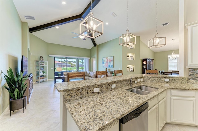 518 Chantilly Trl, Bradenton, FL 34212 - kitchen with a sink, a chandelier, stainless steel dishwasher, open floor plan, and high vaulted ceiling