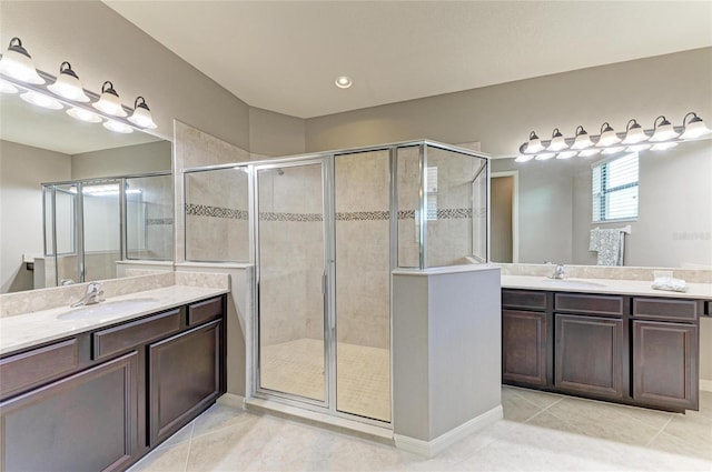 518 Chantilly Trl, Bradenton, FL 34212 - full bath with a shower stall, two vanities, and tile patterned floors