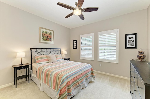518 Chantilly Trl, Bradenton, FL 34212 - bedroom with light carpet, baseboards, and a ceiling fan
