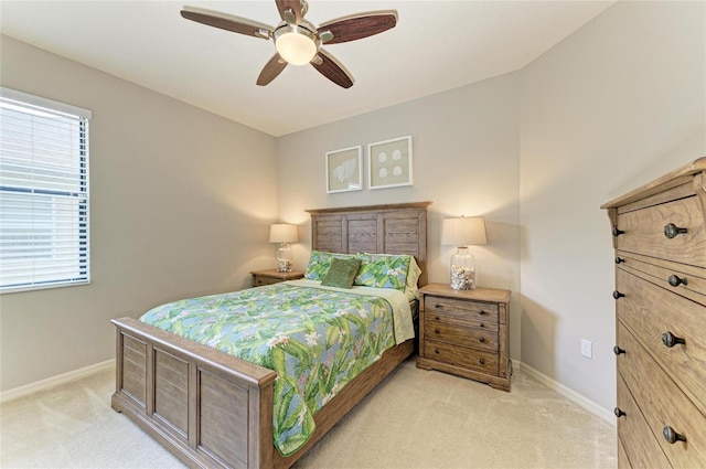 518 Chantilly Trl, Bradenton, FL 34212 - bedroom featuring light carpet, baseboards, and ceiling fan
