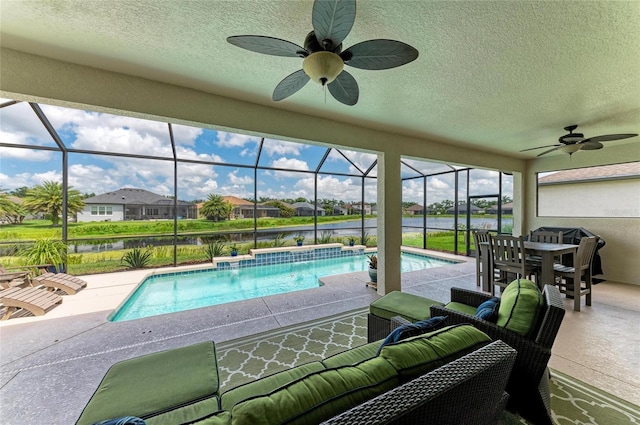 518 Chantilly Trl, Bradenton, FL 34212 - outdoor pool featuring ceiling fan, a water view, a patio area, and an outdoor living space