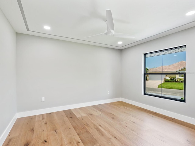 180 Lookout Point Dr, Osprey, FL 34229 - empty room featuring wood finished floors, recessed lighting, and ceiling fan