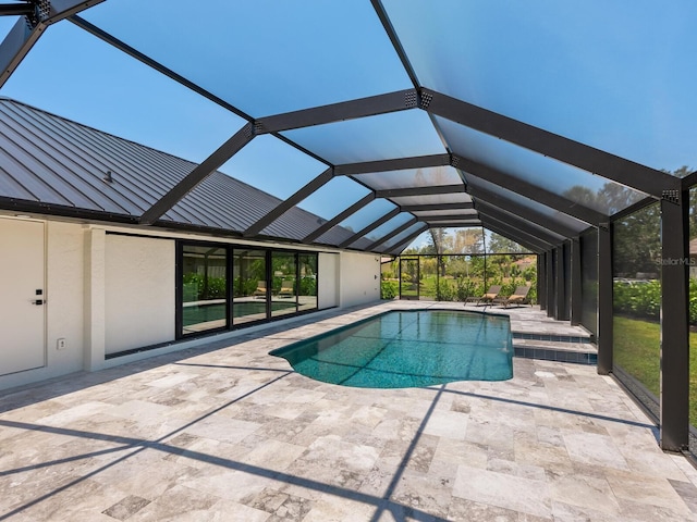 180 Lookout Point Dr, Osprey, FL 34229 - swimming pool with a patio and glass enclosure