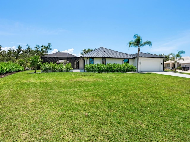 180 Lookout Point Dr, Osprey, FL 34229 - single story home with driveway, a garage, a front yard, a metal roof, and a lanai