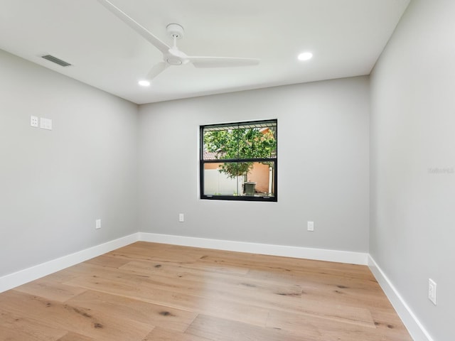 180 Lookout Point Dr, Osprey, FL 34229 - empty room with a ceiling fan, recessed lighting, and light wood-style flooring