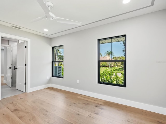 180 Lookout Point Dr, Osprey, FL 34229 - unfurnished bedroom with recessed lighting, wood finished floors, and ceiling fan