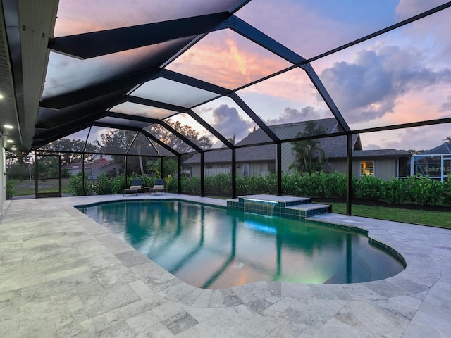 180 Lookout Point Dr, Osprey, FL 34229 - swimming pool with a patio and glass enclosure