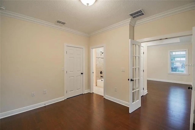 1420 E Frierson Ave, Tampa, FL 33603 - unfurnished room featuring wood finished floors, crown molding, a textured ceiling, baseboards, and french doors