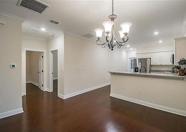 1420 E Frierson Ave, Tampa, FL 33603 - kitchen with stainless steel refrigerator with ice dispenser, dark wood-type flooring, recessed lighting, crown molding, and baseboards