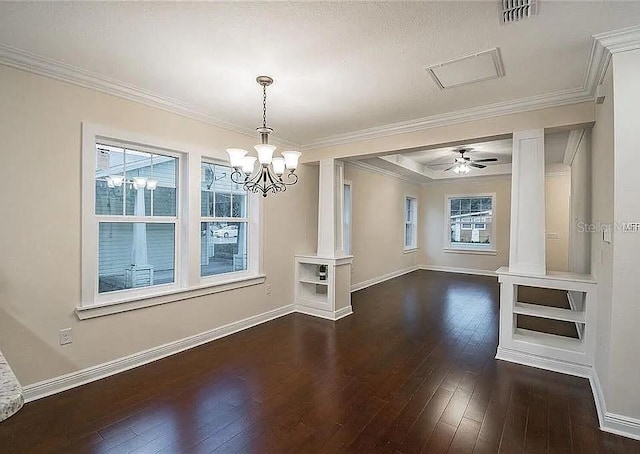 1420 E Frierson Ave, Tampa, FL 33603 - unfurnished dining area with dark wood-style flooring, crown molding, baseboards, and a chandelier