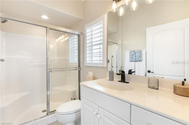 10202 L Pavia Blvd Unit 10202, Venice, FL 34292 - full bath featuring a stall shower, vanity, toilet, and a chandelier
