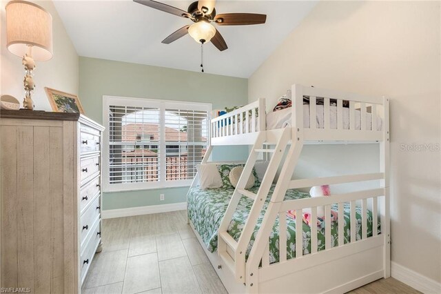 10202 L Pavia Blvd Unit 10202, Venice, FL 34292 - bedroom with baseboards and a ceiling fan