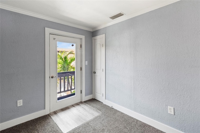 800 S Blvd Of The Presidents Unit 5, Sarasota, FL 34236 - empty room with crown molding, baseboards, carpet floors, and a textured wall