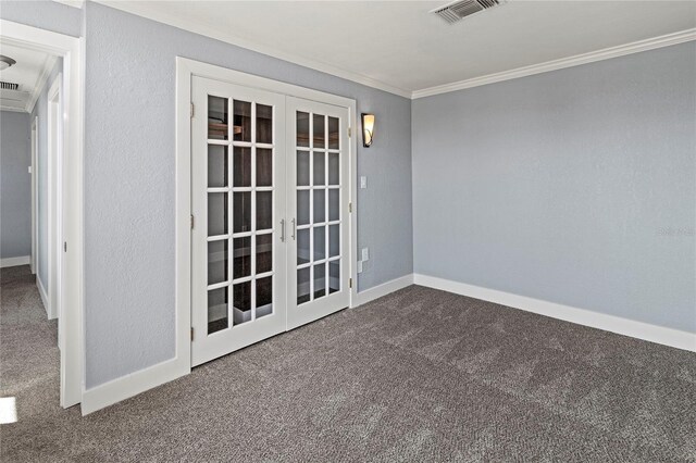 800 S Blvd Of The Presidents Unit 5, Sarasota, FL 34236 - empty room featuring french doors, dark carpet, crown molding, and baseboards