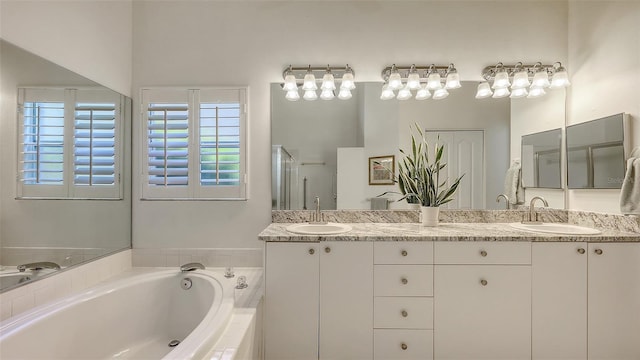 4208 Balmoral Way, Sarasota, FL 34238 - bathroom with double vanity and a bath