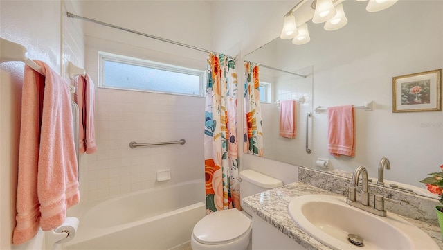 4208 Balmoral Way, Sarasota, FL 34238 - bathroom featuring shower / bath combination with curtain, vanity, and toilet