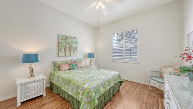4208 Balmoral Way, Sarasota, FL 34238 - bedroom featuring baseboards, wood finished floors, and ceiling fan