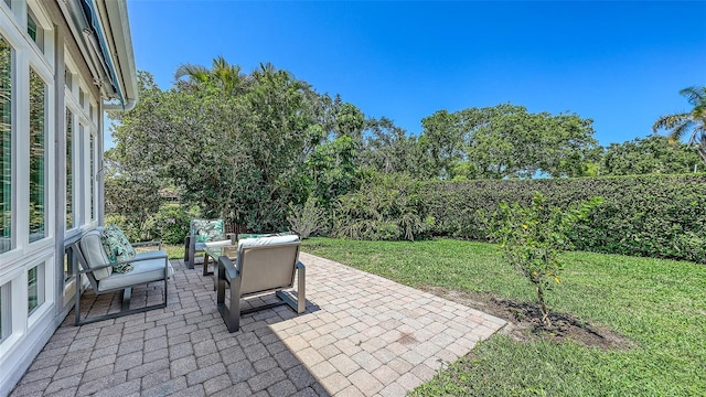 4208 Balmoral Way, Sarasota, FL 34238 - view of patio / terrace featuring an outdoor hangout area