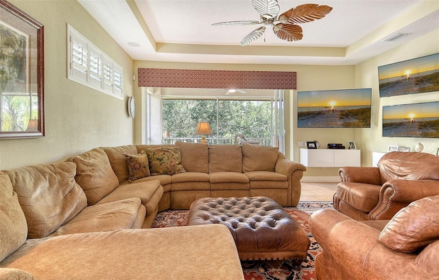 6552 Moorings Point Cir Unit 201, Lakewood Ranch, FL 34202 - living area with ceiling fan and a tray ceiling