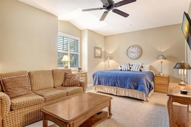 6552 Moorings Point Cir Unit 201, Lakewood Ranch, FL 34202 - carpeted bedroom featuring vaulted ceiling and ceiling fan