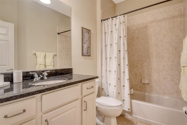 6552 Moorings Point Cir Unit 201, Lakewood Ranch, FL 34202 - full bathroom featuring vanity, toilet, shower / bath combination with curtain, and tile patterned floors
