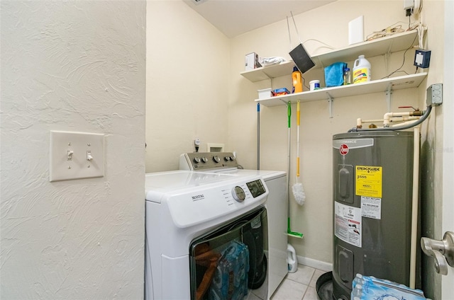 716 SE 12th Ct Unit 31, Cape Coral, FL 33990 - washroom featuring electric water heater, washing machine and clothes dryer, and light tile patterned flooring