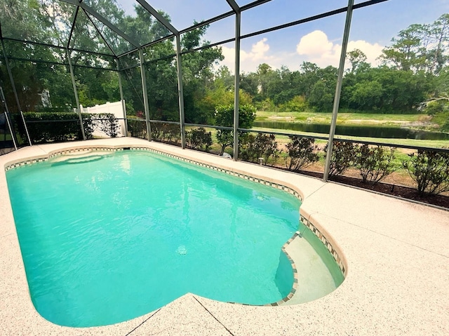 13809 18th Pl E, Bradenton, FL 34212 - swimming pool with glass enclosure, a water view, view of scattered trees, and a patio